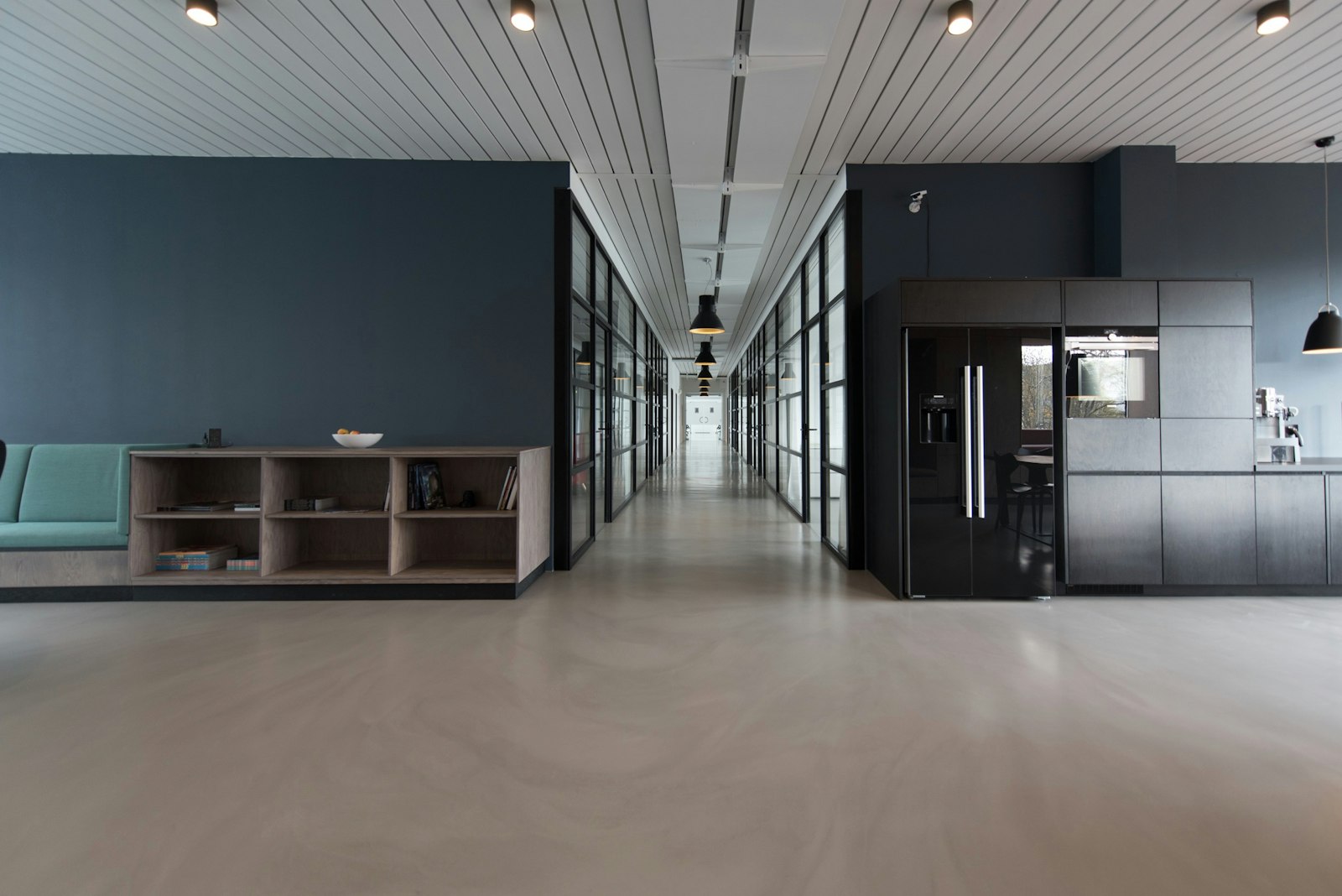 Modern office interior with dark feature walls